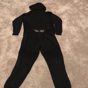 A sweatpants and a zip up hoodie